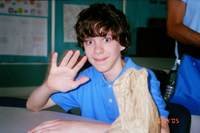Adam Lanza t desk Waving.jpg